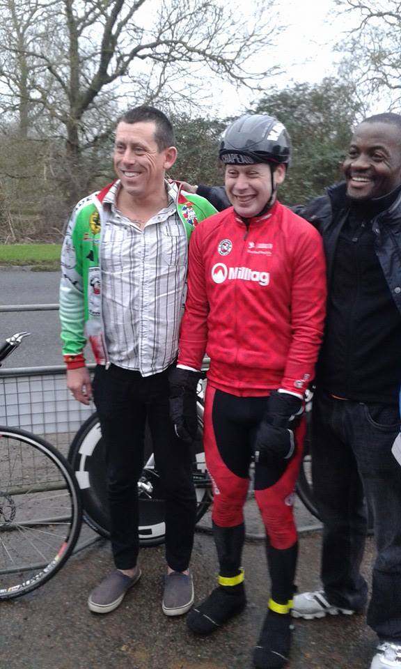 Idai with cyclists Steve Abraham (C) and Chris Hopkinson (L)